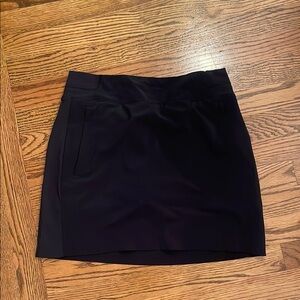 Athleta black skort with zipper pockets sz 4